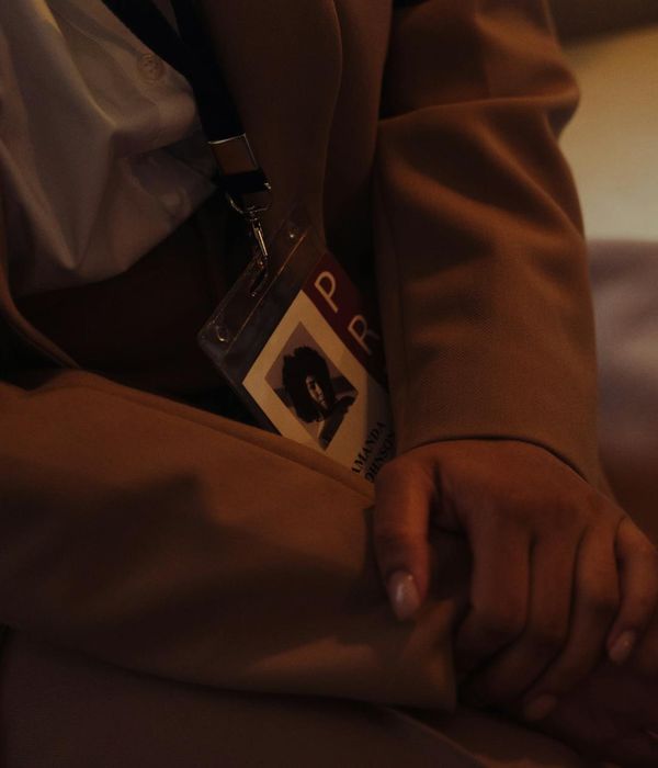 Person stretching peacefully with a scenic background.